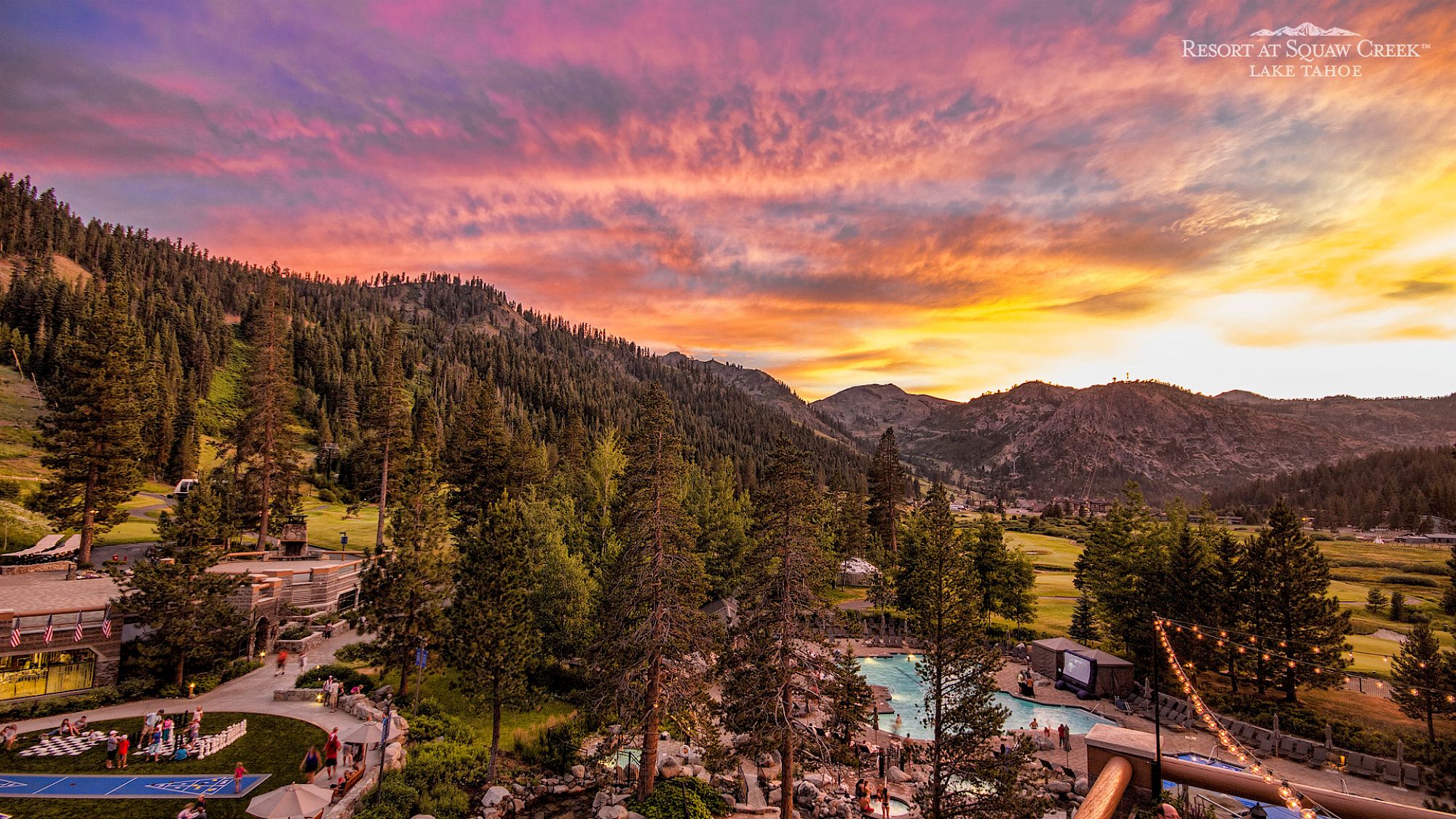Sunset over Olympic Valley and Palisades Tahoe mountains from Everline