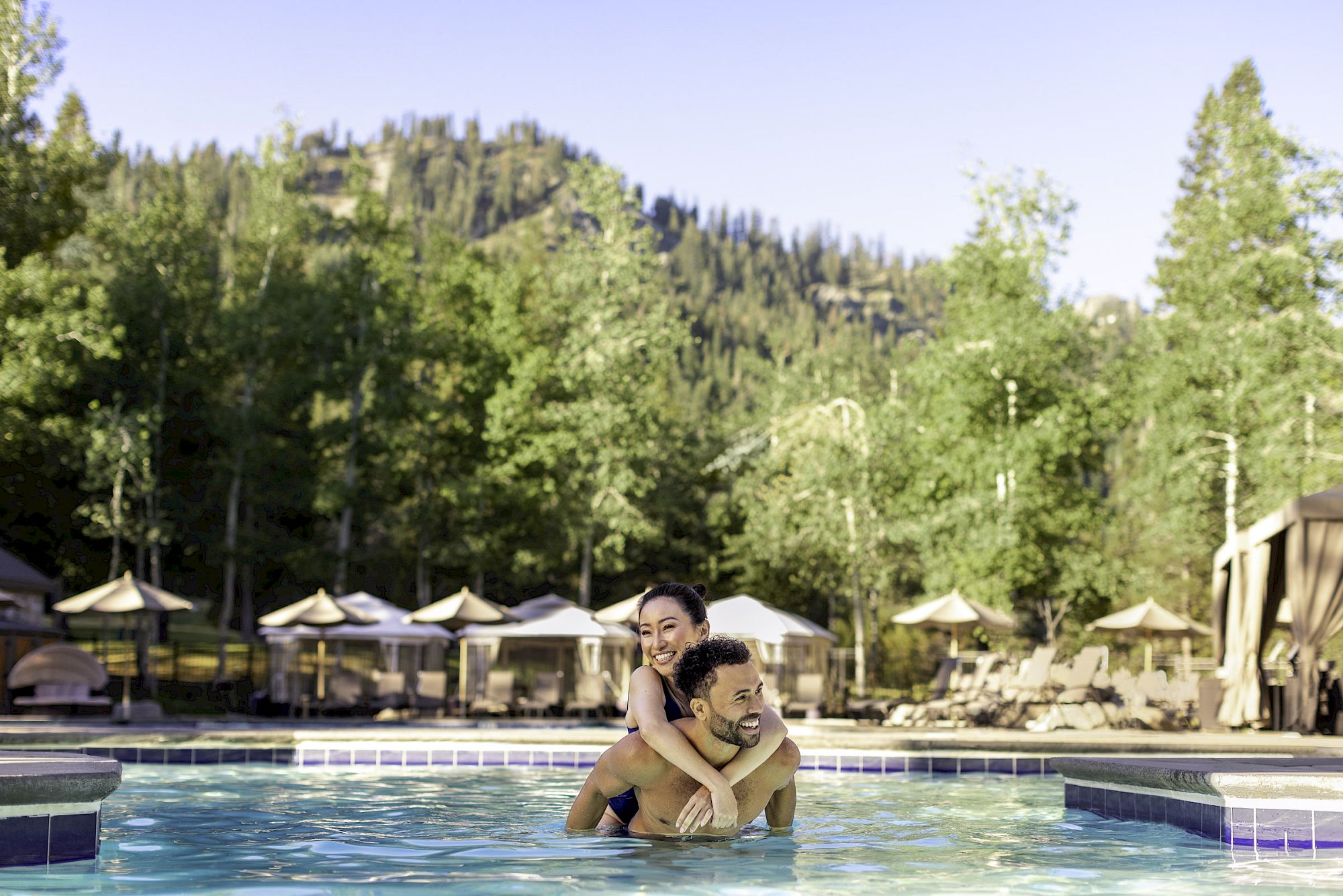 Everline outdoor pool with Olympic Valley mountain backdrop